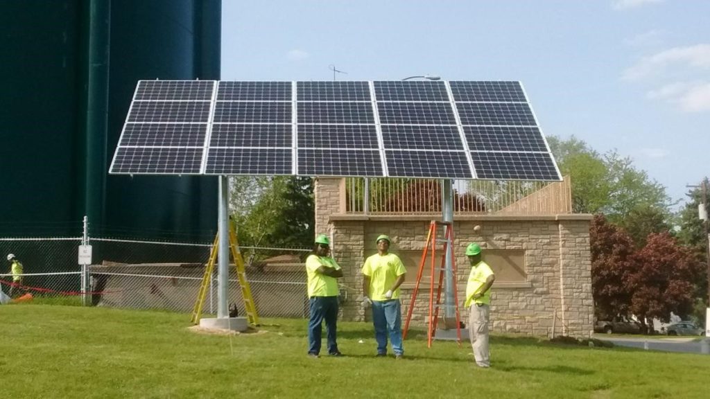 GreenPower program participants and a completed on-site solar installation.